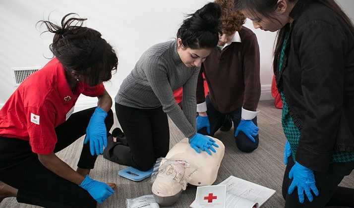 woman demonstrating CPR