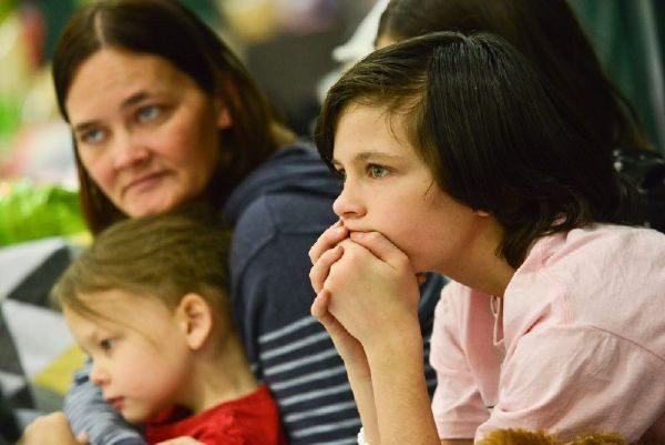 Family looking distressed.