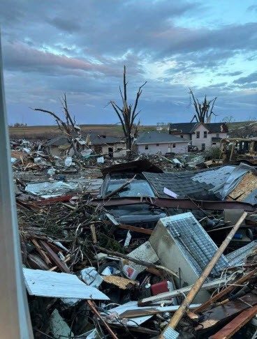 Damage to a house in Iowa after a tornado