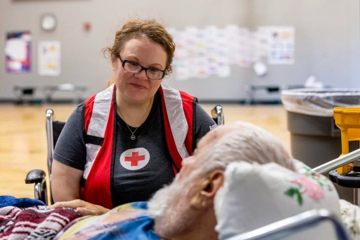 A volunteer provides support in Iowa