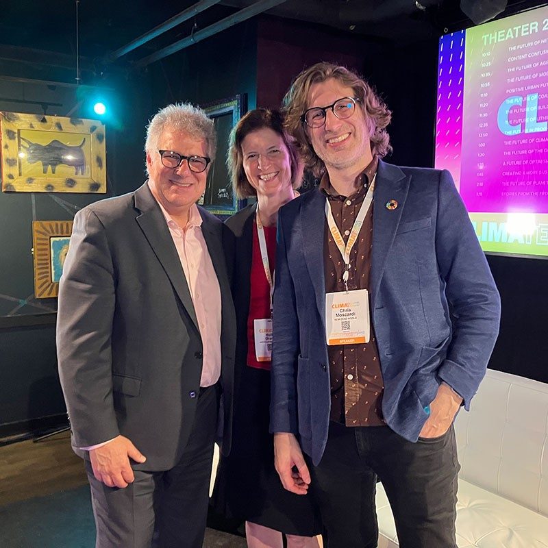 Holly Grant and two other attendees at ClimaTech 2024 take a group photo.