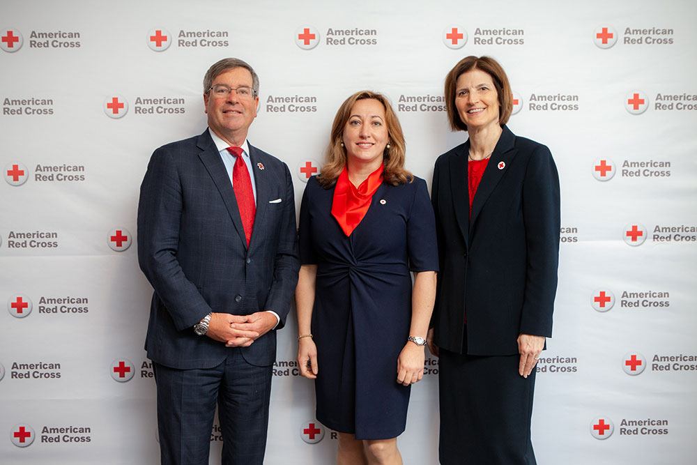 Group photo of three people in Professional business attire