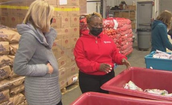 Sharon Curry helping in food pantry