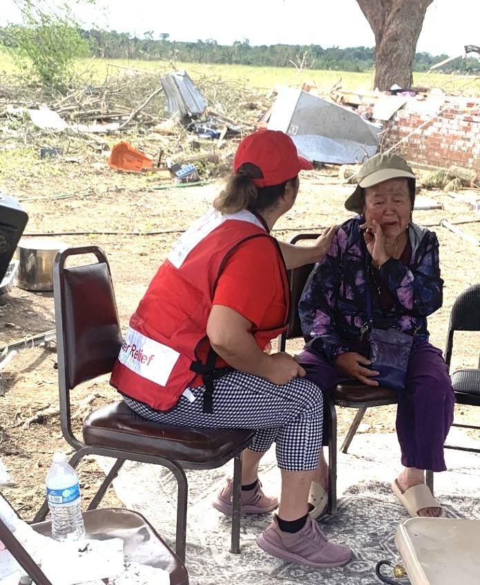 volunteer consoling resident