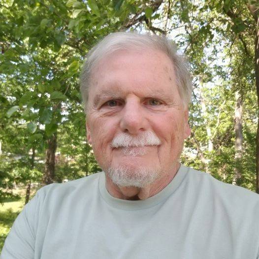 Don Barnett smiling.