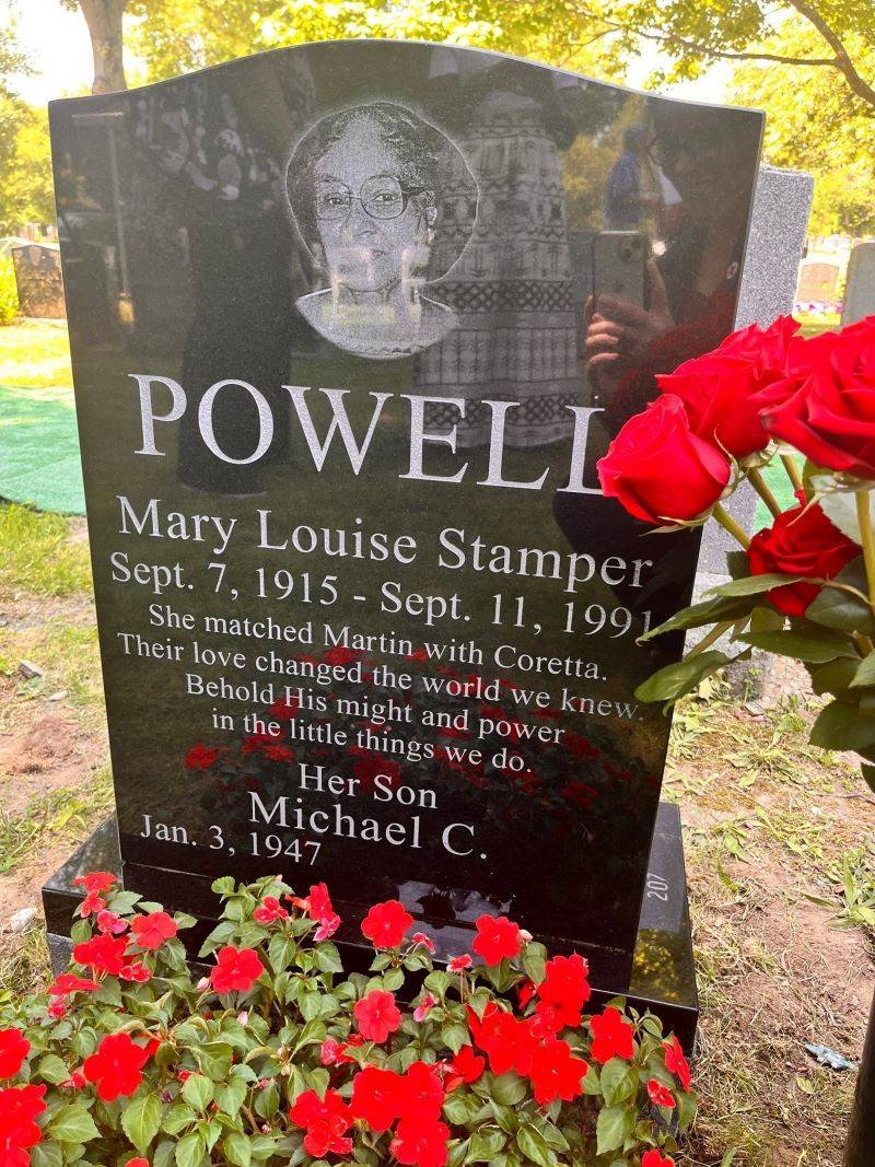 Mary Louise Powell headstone with flowers.