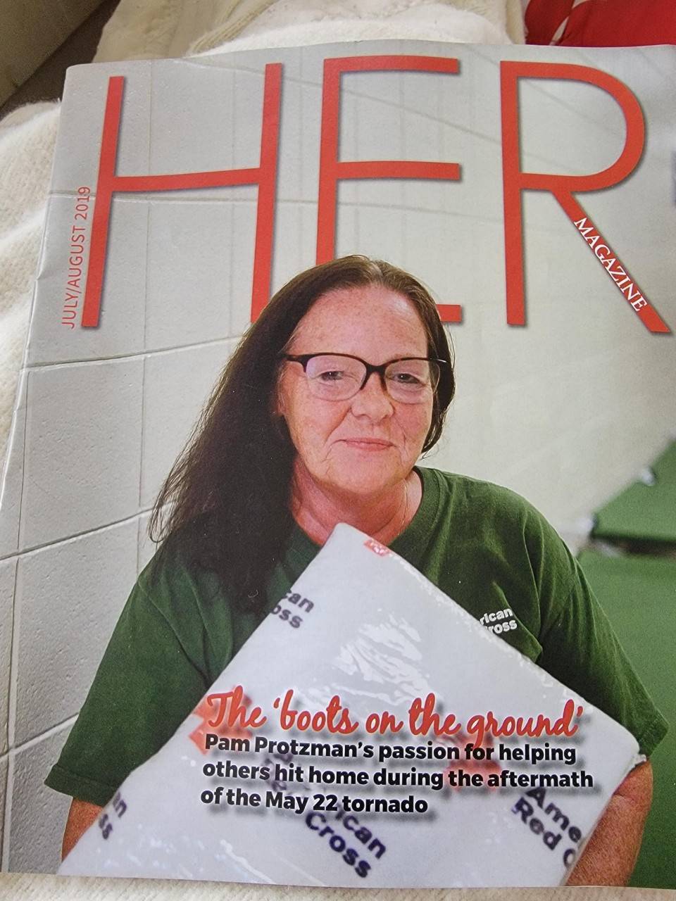 pam protzman on the cover of HER magazine.