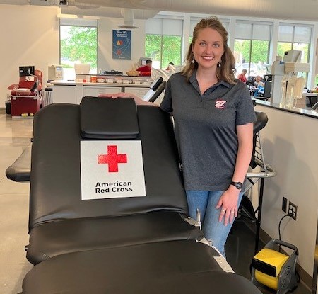 woman standing in a blood donation center 