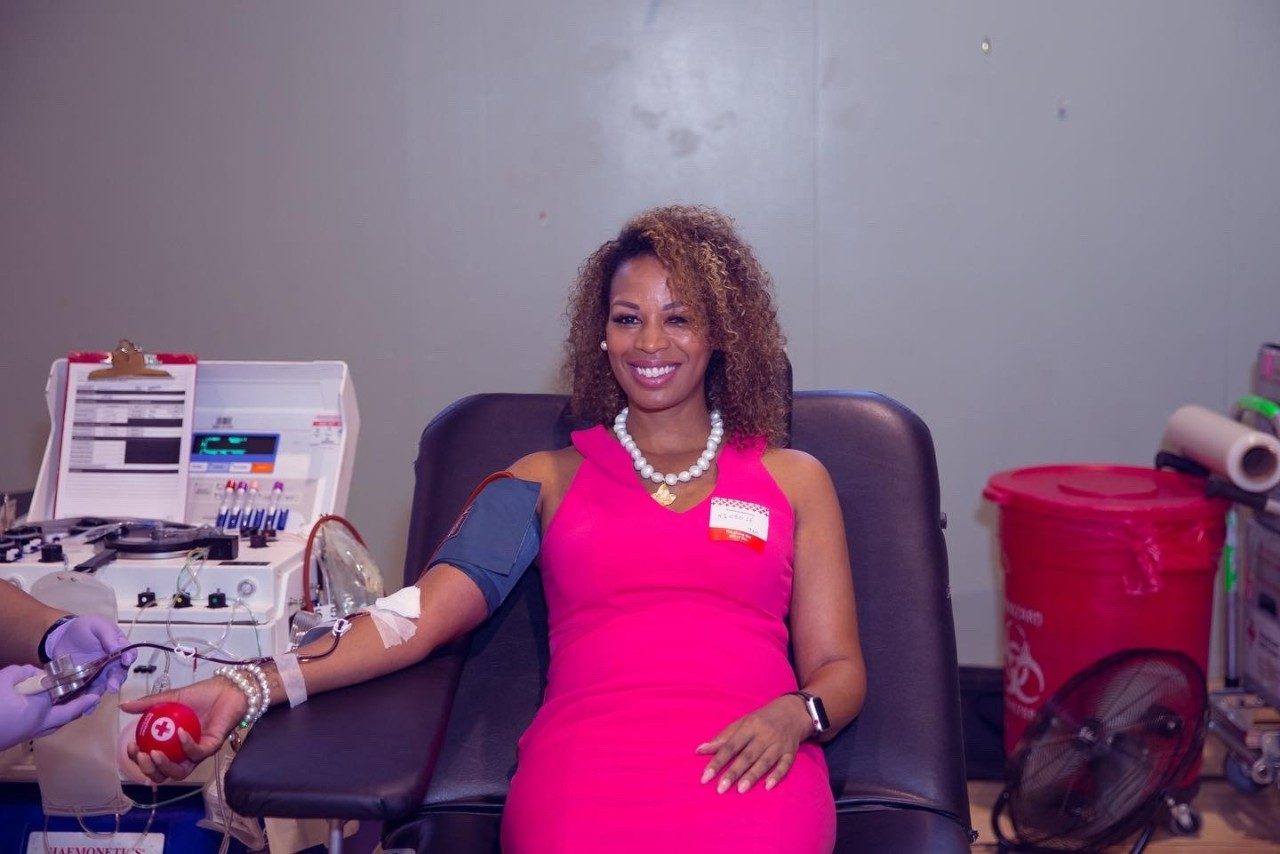 Nichole Jordan donating blood.